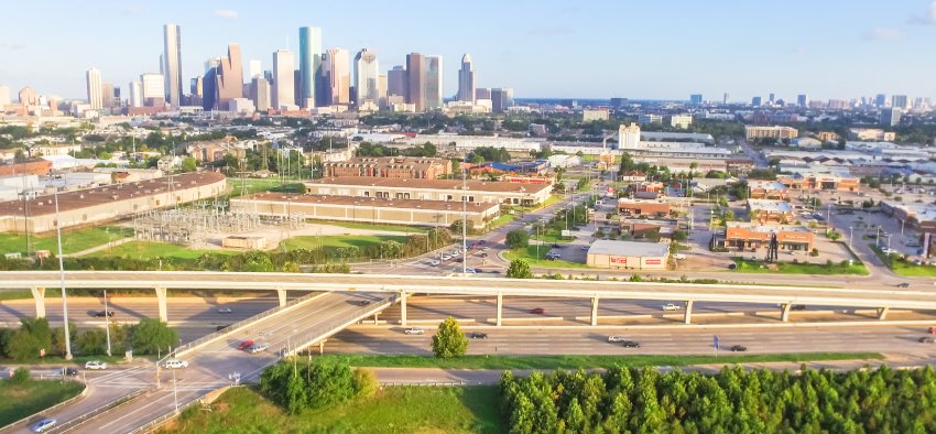 
                        Lonestar Key Master – Professional locksmith services in Katy, Texas, featuring an aerial view of highways, commercial areas, and the Houston skyline. 24/7 locksmith solutions.